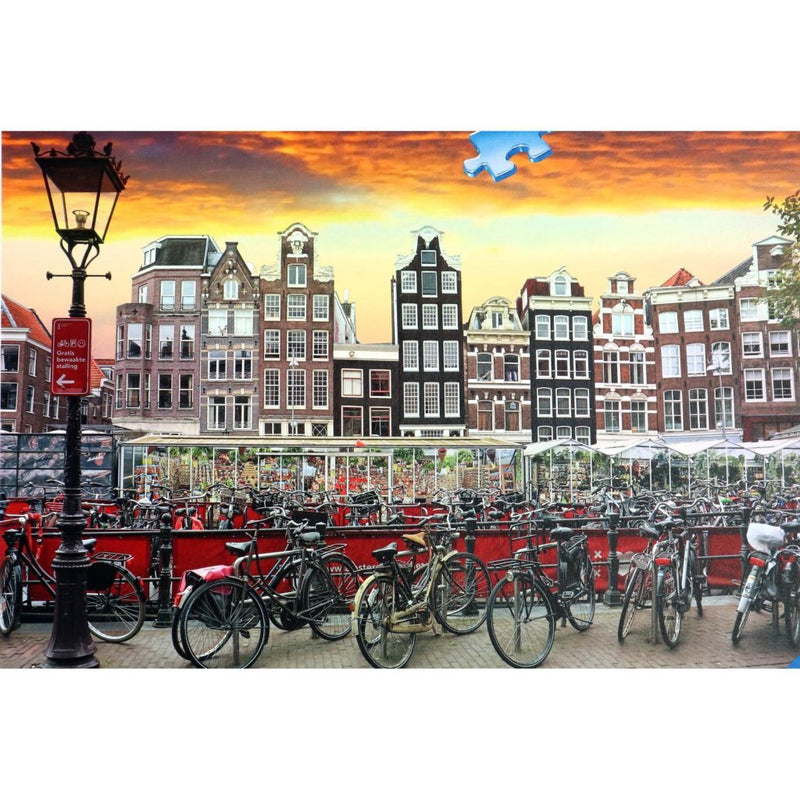 Laad de afbeelding in de Gallery-viewer, Ravensburger Puzzel Amsterdam Fietsenstalling 1000 Stukjes
