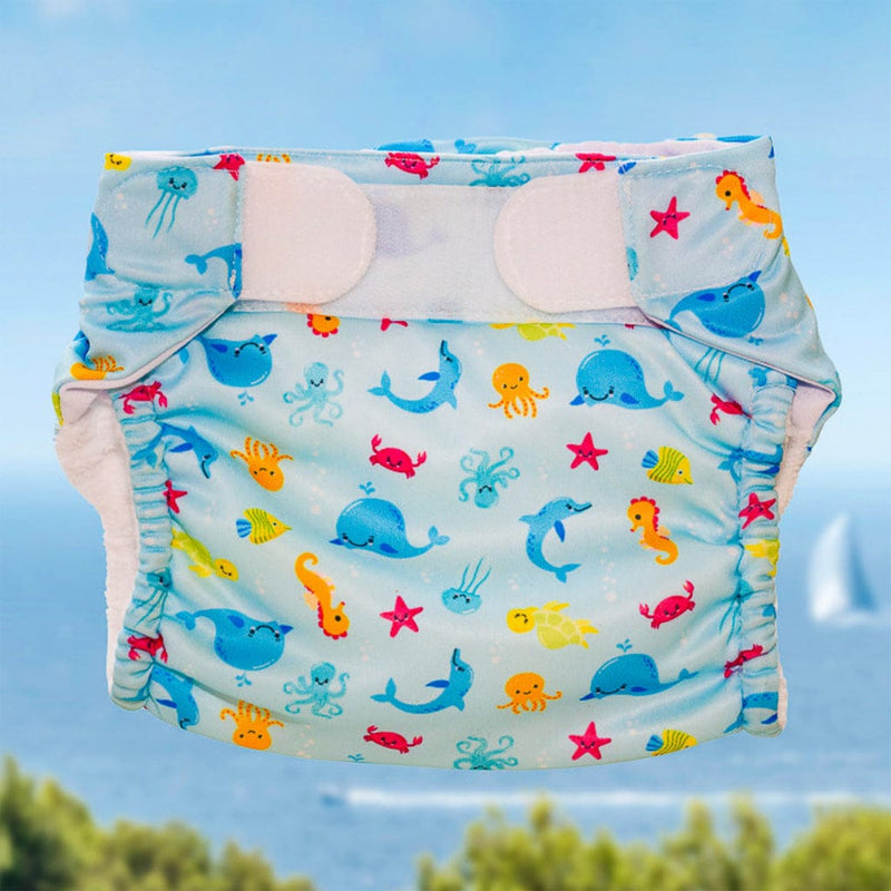 Laad de afbeelding in de Gallery-viewer, Freds Swim Academy Wasbare Zwemluier Zeedieren Maat 1 4-9 Kg Blauw
